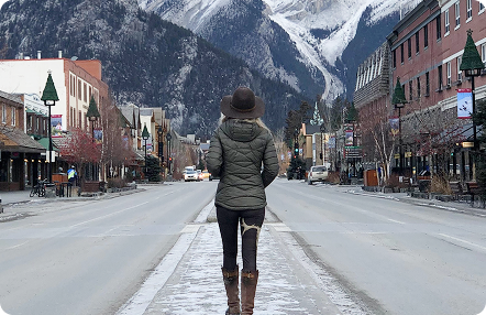 Traveler posing on a street in Banff