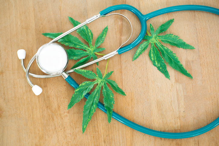 Marijuana leaf and stethoscope.
