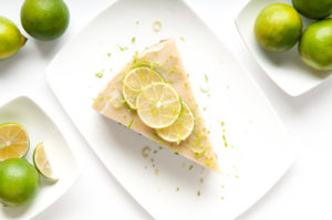 Vegan Key Lime Pie Slice and KeyLimes