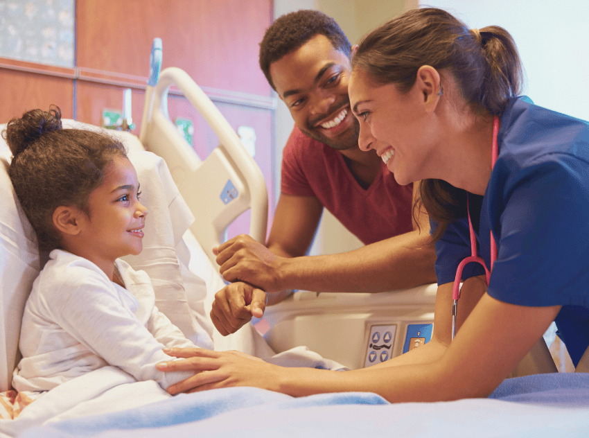 Blog image of nurse with child for blog titled "What are the different types of travel nurse assignments?"