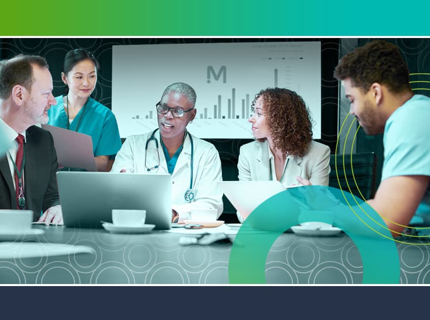 healthcare professionals and business man sitting around conference room table