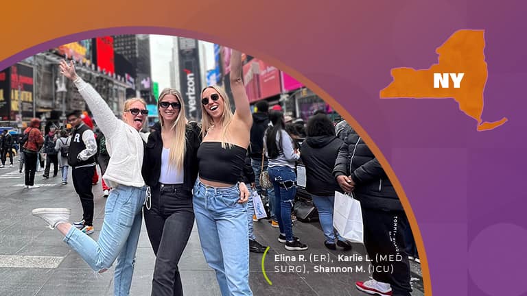 Three girls standing in time square new york