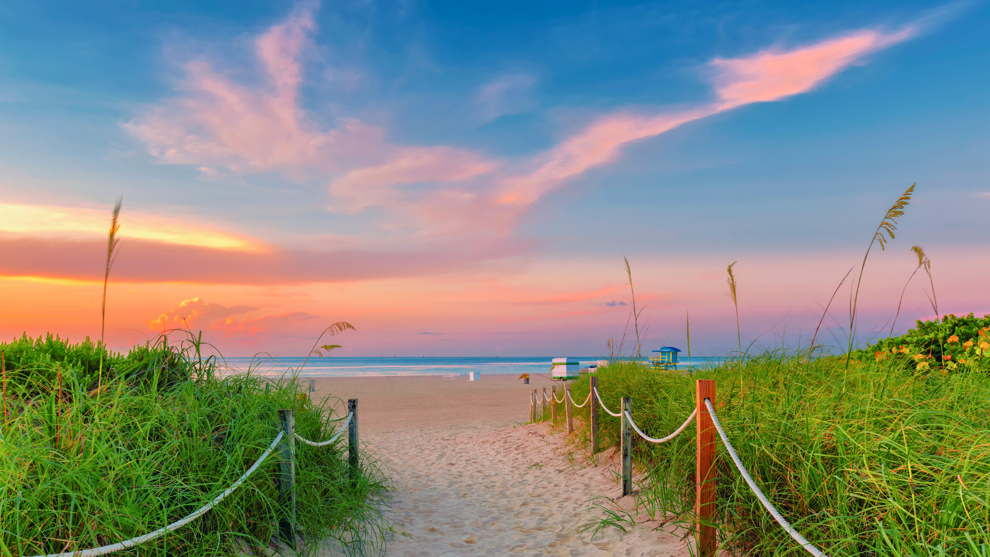 Sandy walk way down to the beach in the Carolinas at sunset.